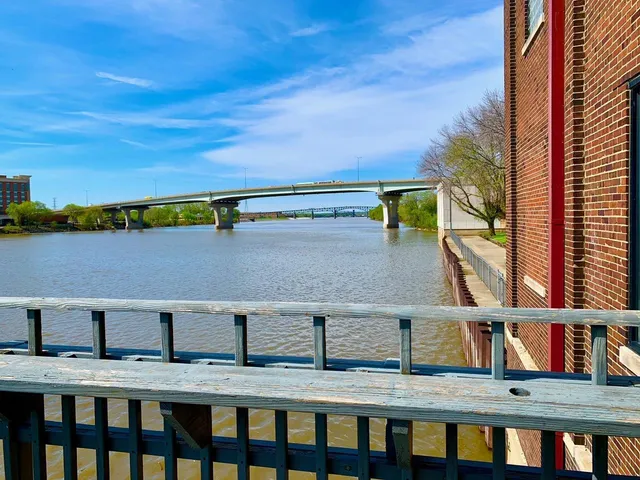 a view of a swimming pool with a yard