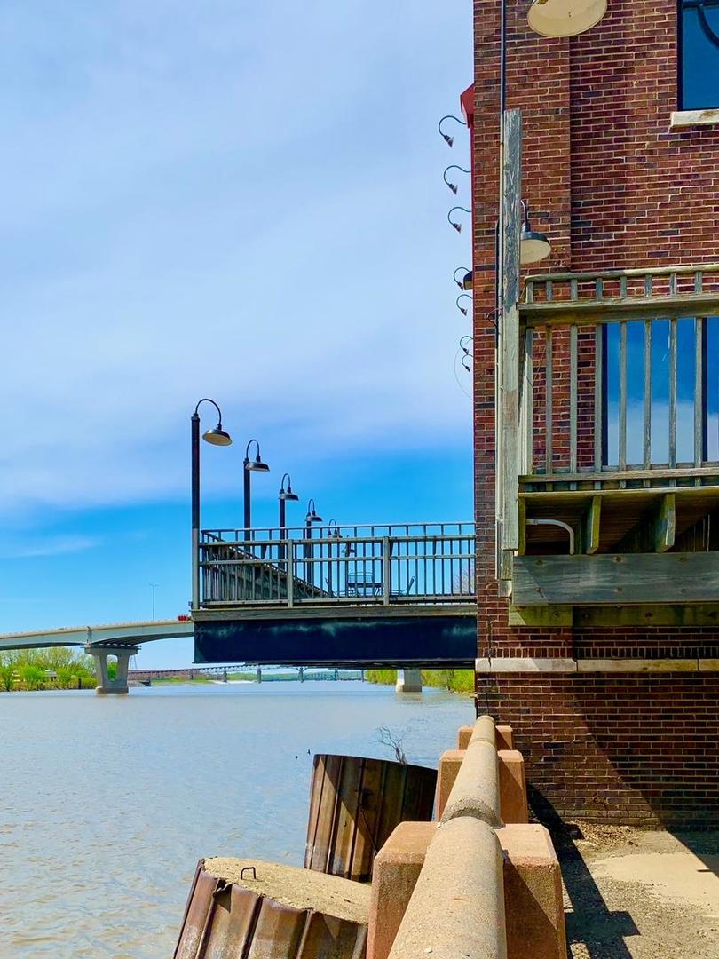 330 Southwest Water Street Peoria, IL 61602 - Photo 3 of 17 a view of a balcony with a patio