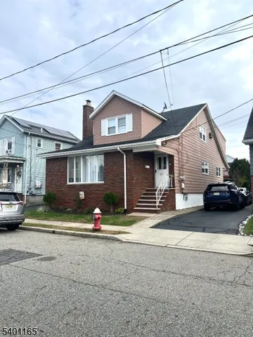 a view of a car in front of house