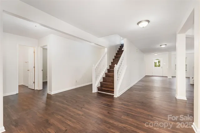 a view of entryway with wooden floor