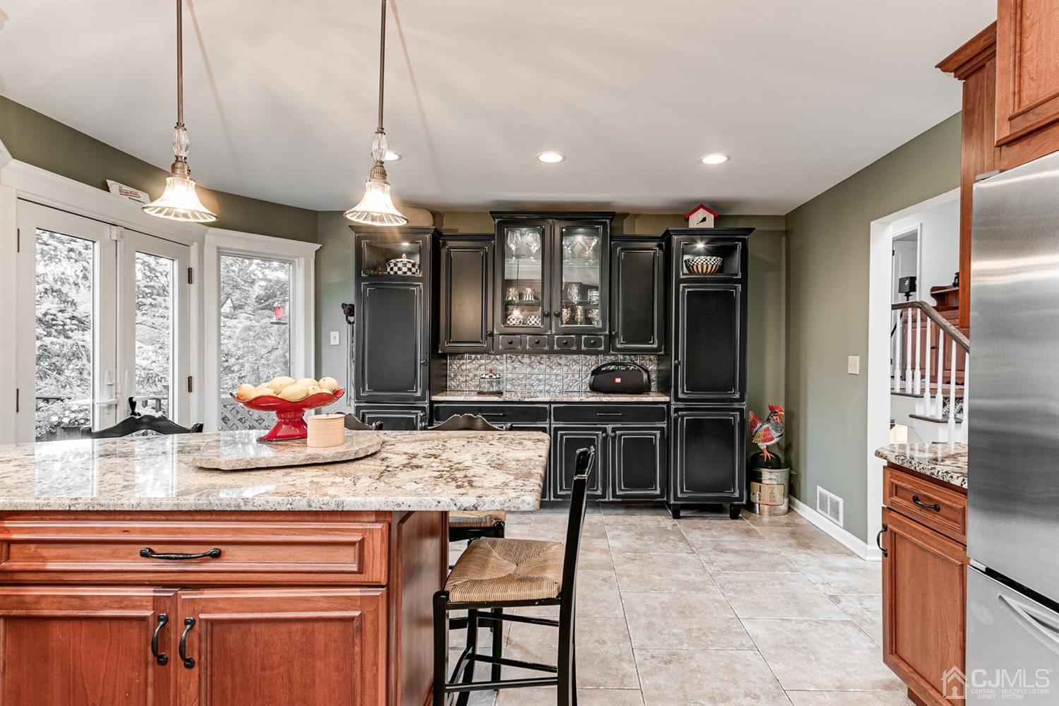 4 Moraine Road Edison, NJ 08820 - Photo 19 of 57 a kitchen with stainless steel appliances granite countertop a stove and a sink