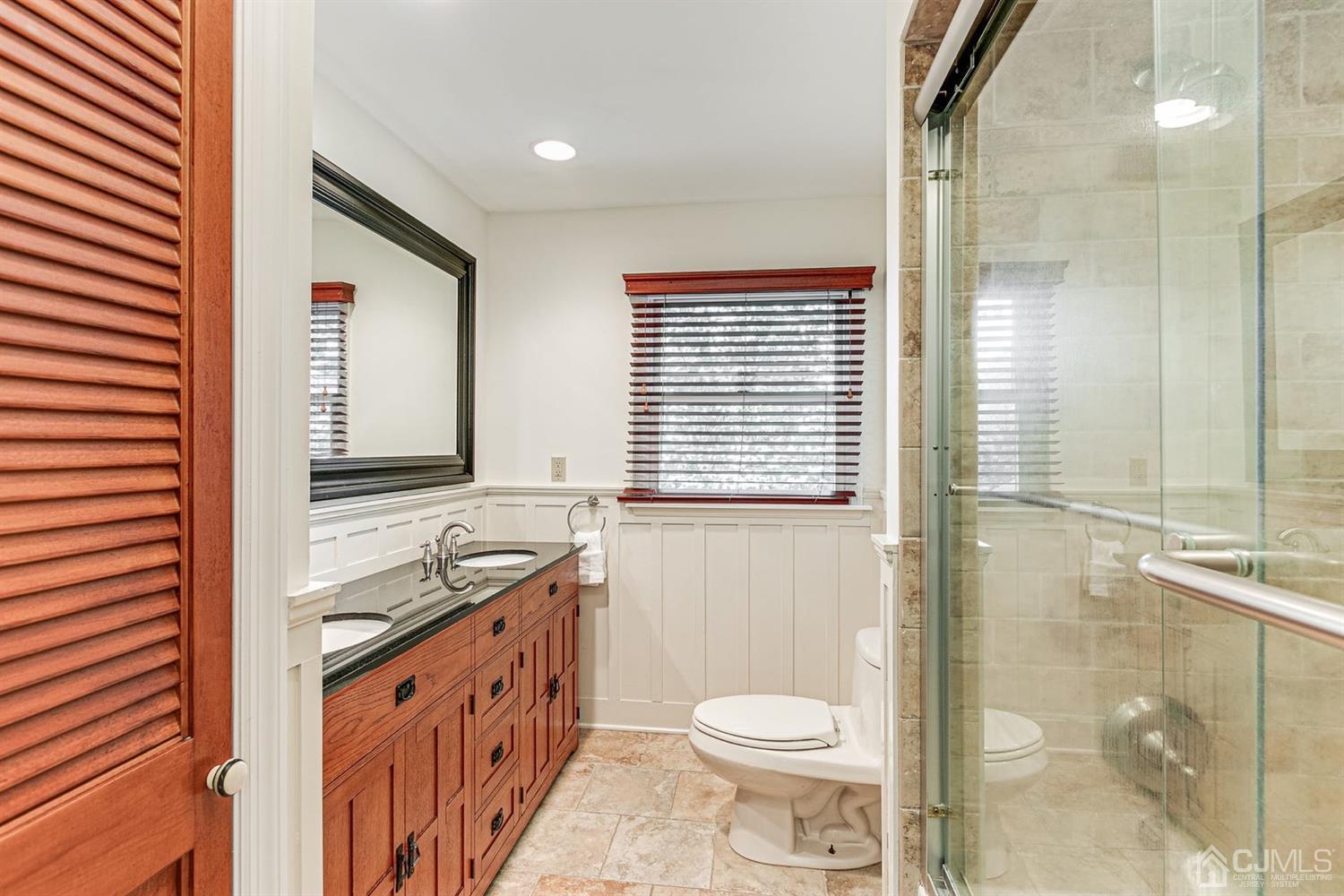 4 Moraine Road Edison, NJ 08820 - Photo 23 of 57 a bathroom with a granite countertop sink toilet and shower