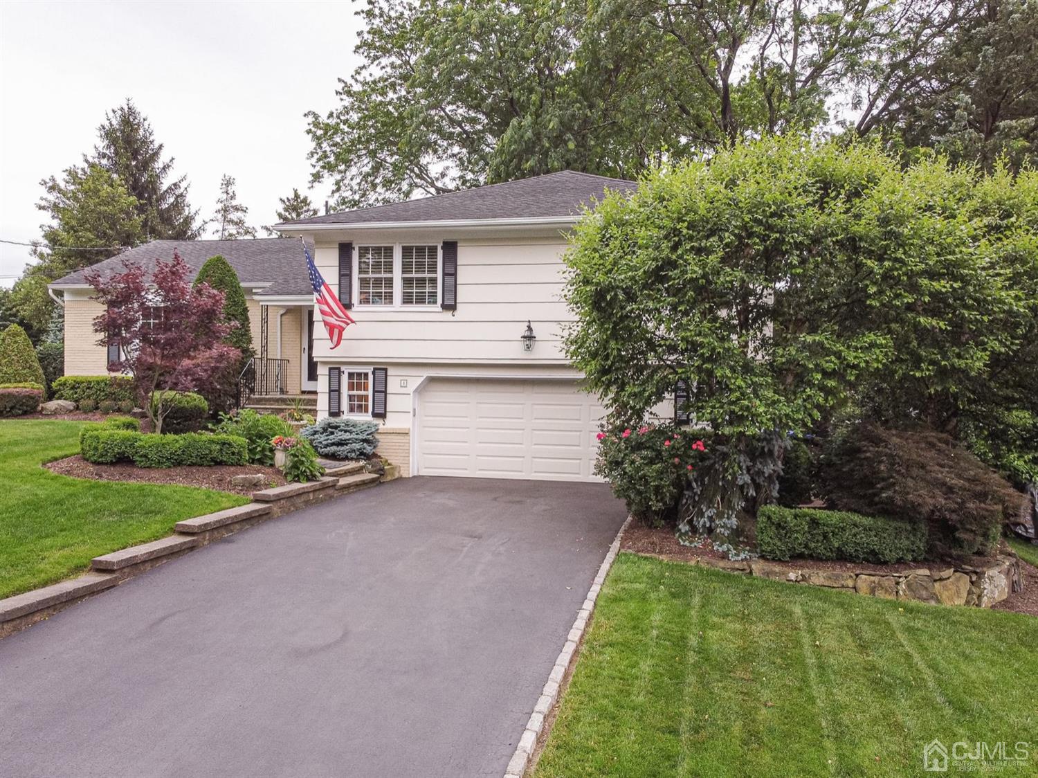 4 Moraine Road Edison, NJ 08820 - Photo 4 of 57 a front view of house with yard and green space