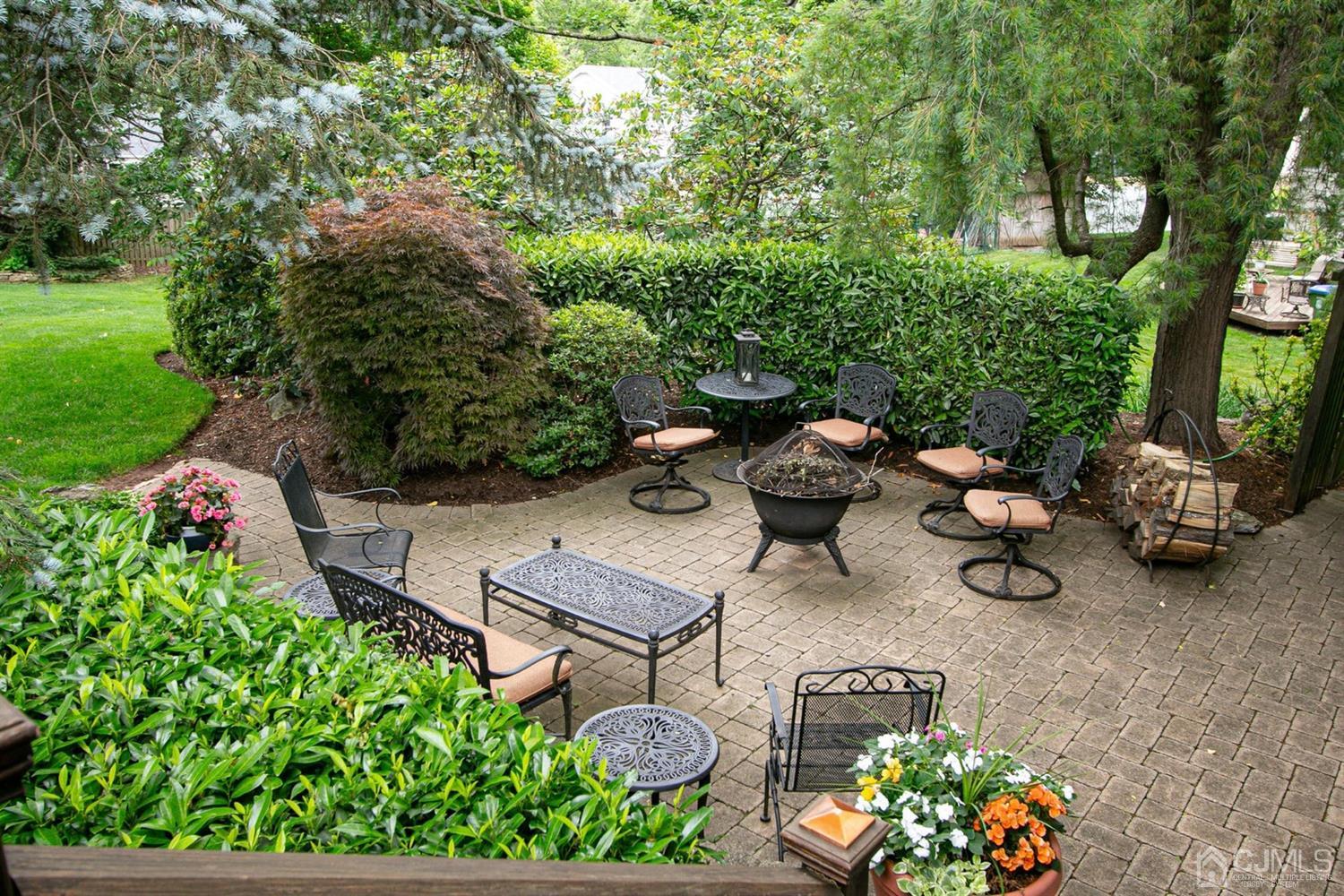 4 Moraine Road Edison, NJ 08820 - Photo 36 of 57 a backyard of a house with lots of green space