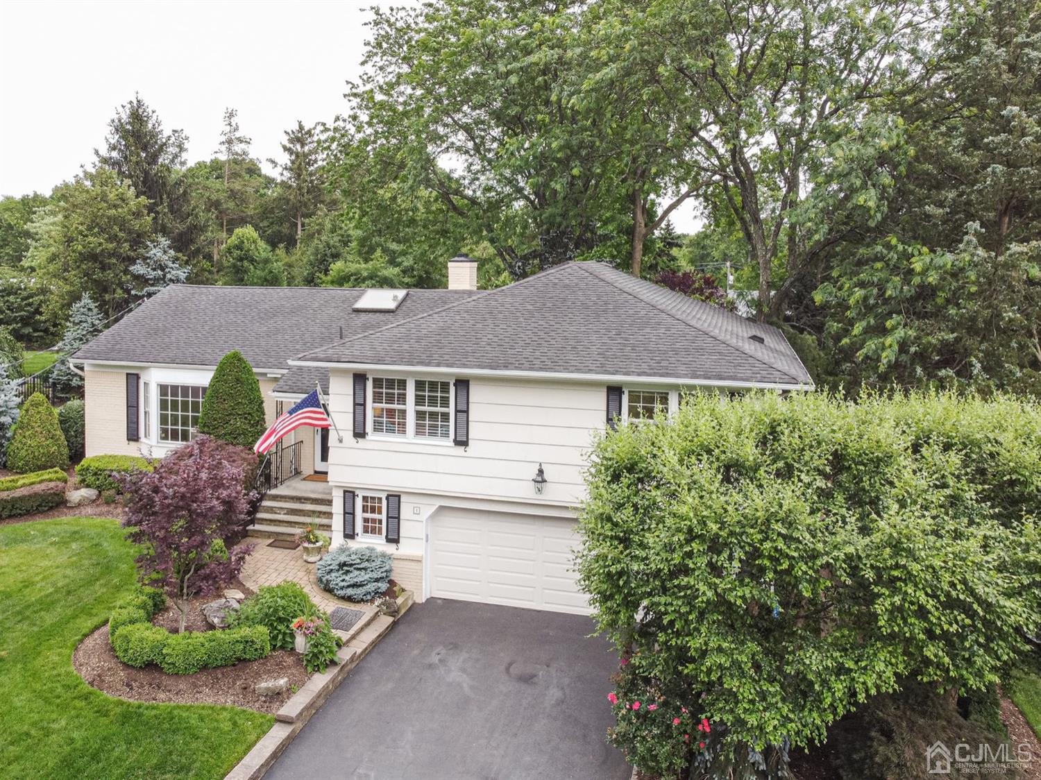 4 Moraine Road Edison, NJ 08820 - Photo 45 of 57 front view of a house with a yard