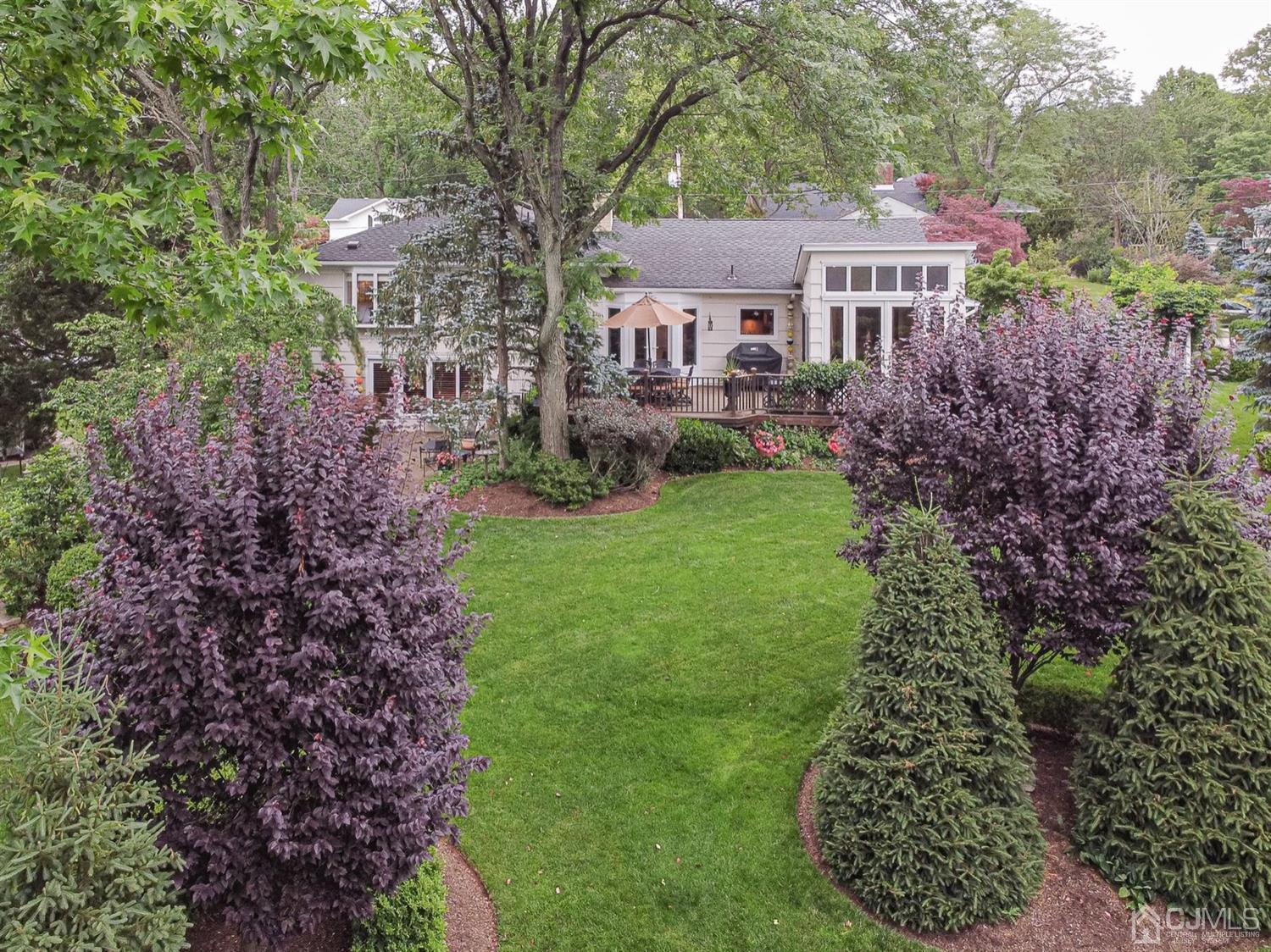 4 Moraine Road Edison, NJ 08820 - Photo 49 of 57 a front view of a house with a garden