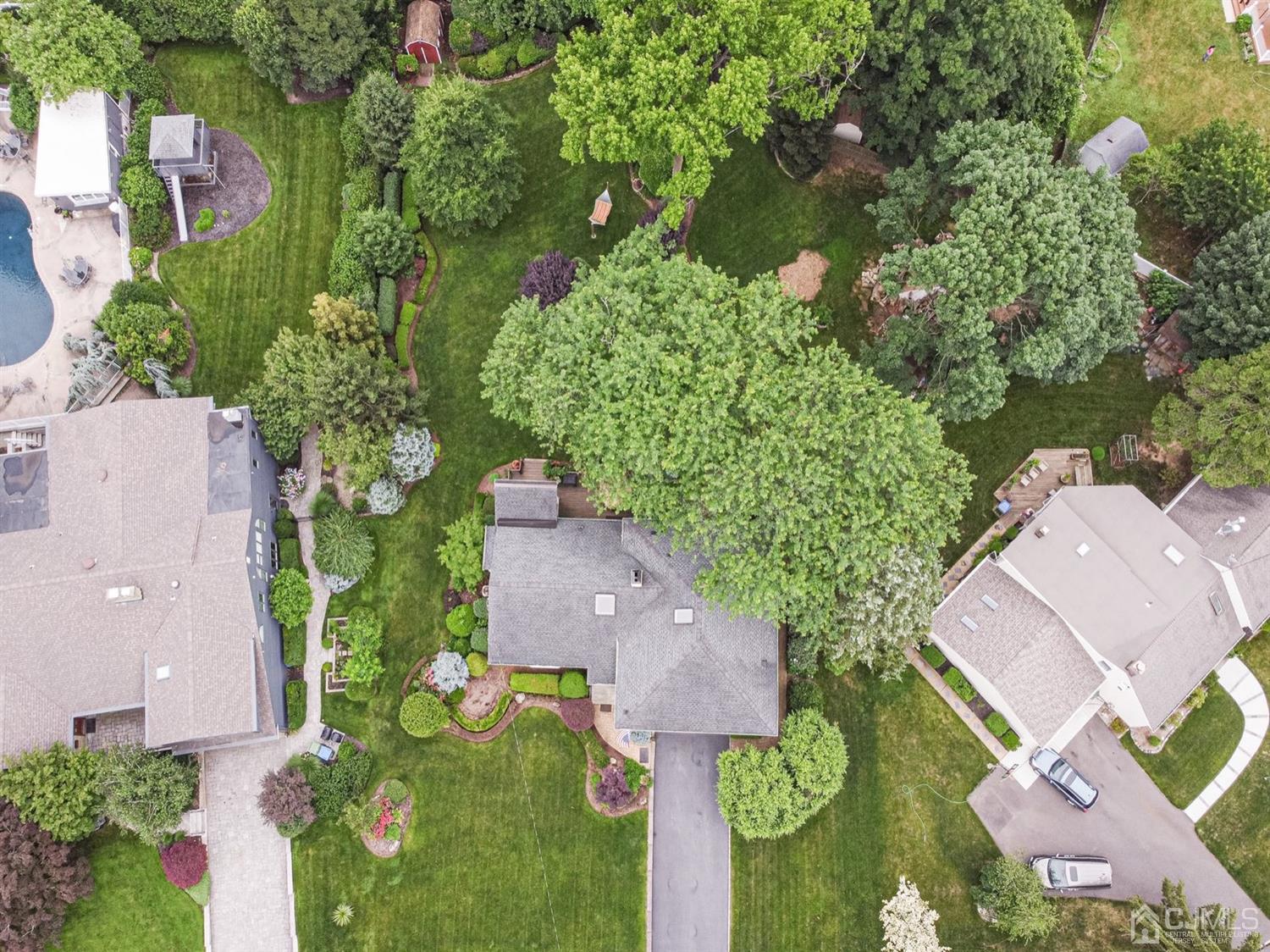 4 Moraine Road Edison, NJ 08820 - Photo 56 of 57 an aerial view of a house with yard swimming pool and outdoor seating
