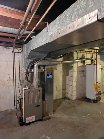 a view of a building with a snow on the yard