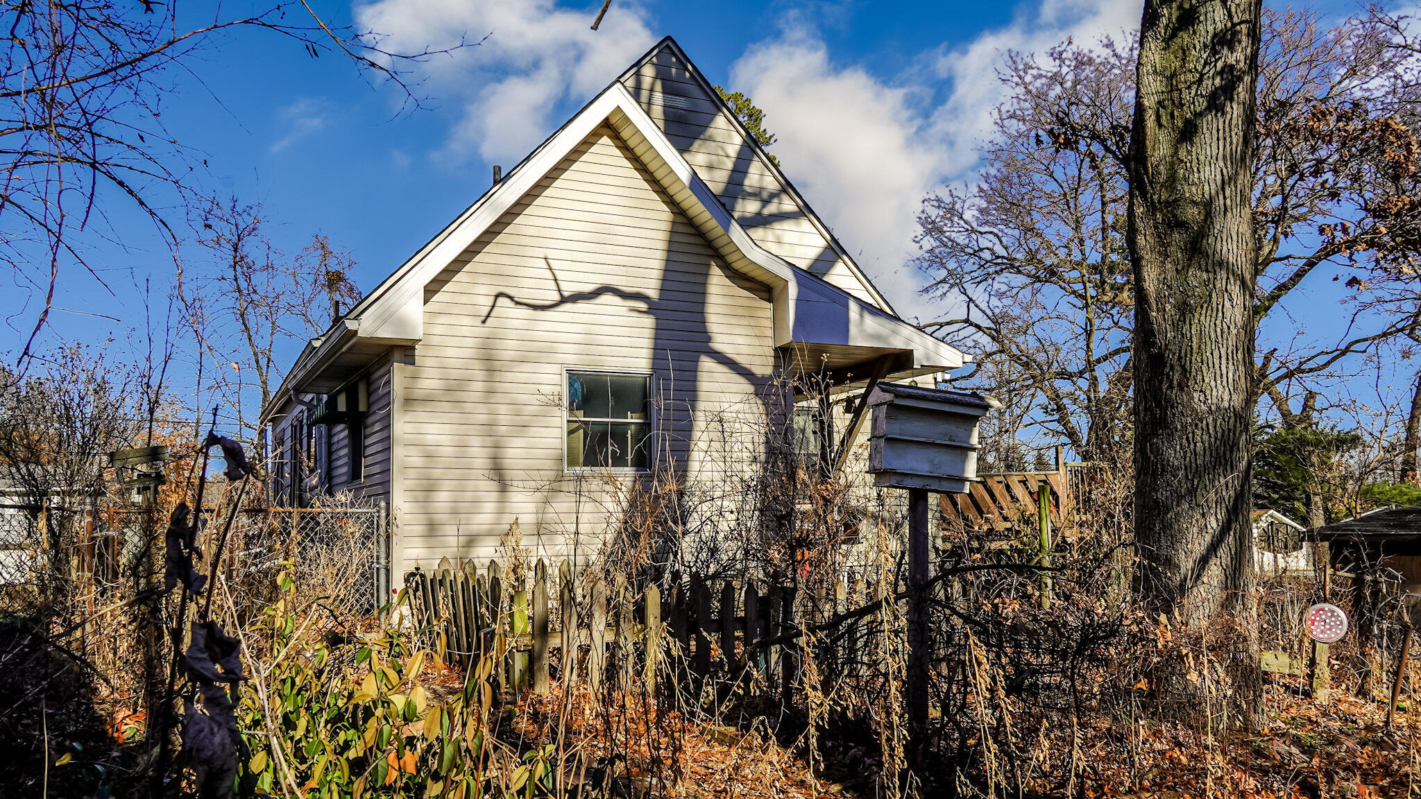 6665 Old Porter Road Portage, IN 46368 - Photo 19 of 20 a view of a house with a yard
