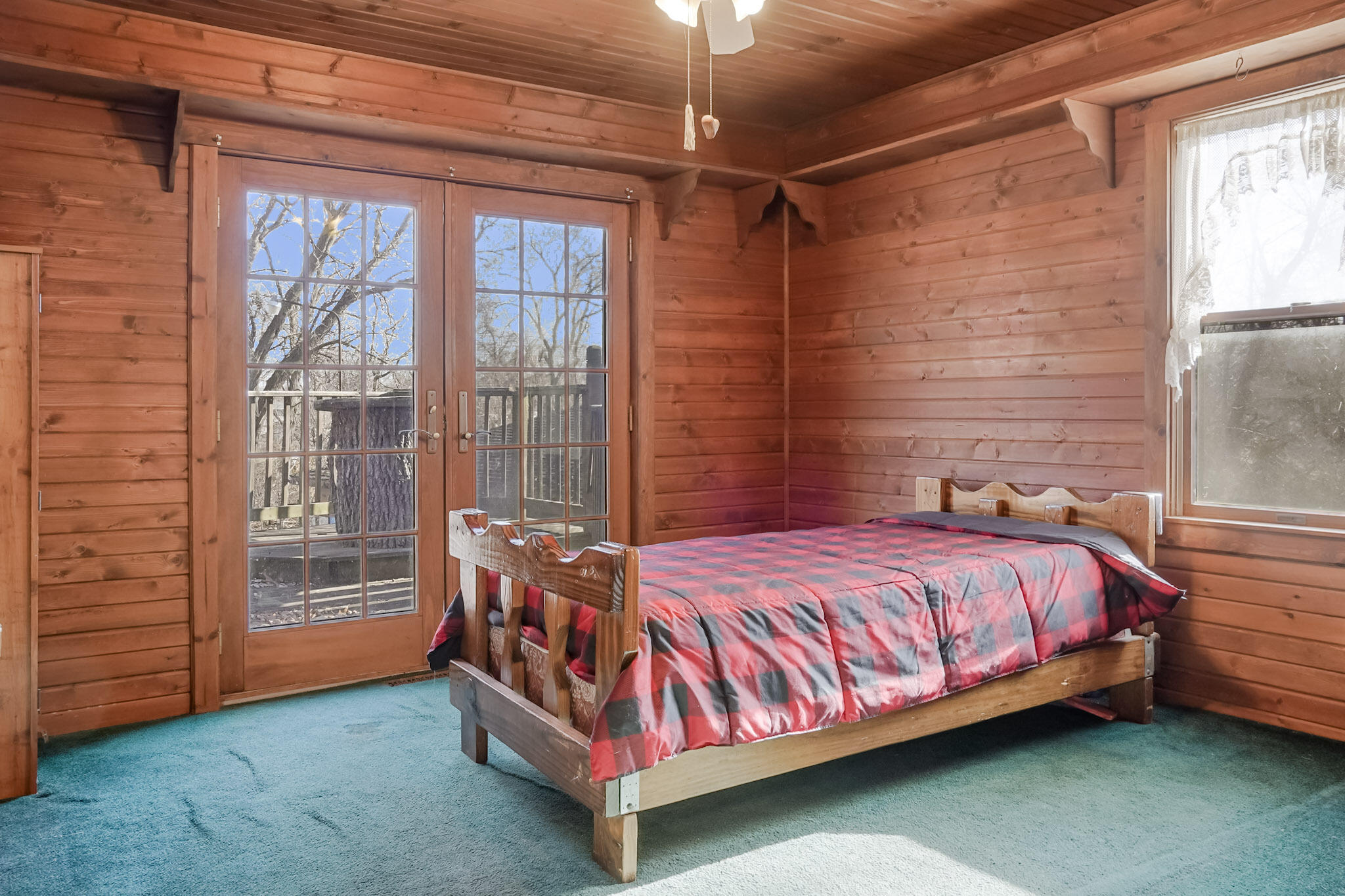 6665 Old Porter Road Portage, IN 46368 - Photo 9 of 20 a large bed sitting in a room next to a window