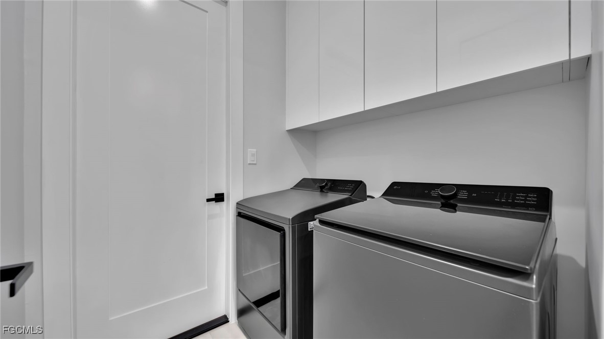 910 Northwest 36th Place Cape Coral, FL 33993 - Photo 16 of 46 a utility room with dryer and washer