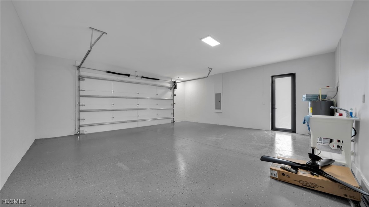 910 Northwest 36th Place Cape Coral, FL 33993 - Photo 17 of 46 a view of a room with gym equipment