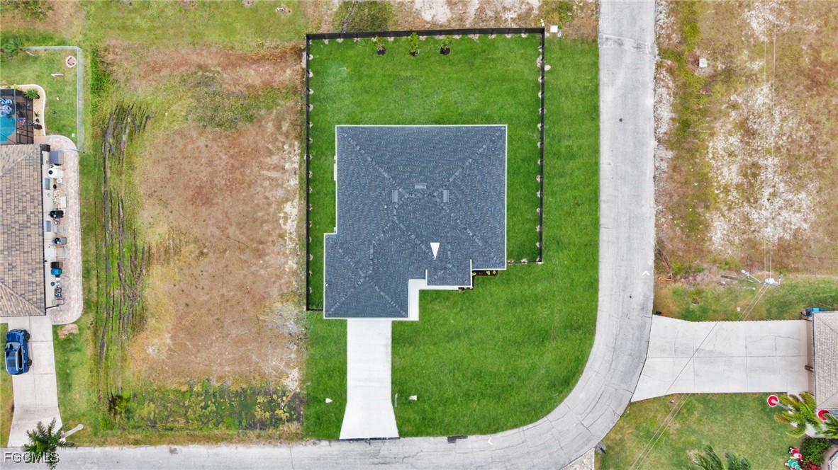 910 Northwest 36th Place Cape Coral, FL 33993 - Photo 46 of 46 a view of a back yard