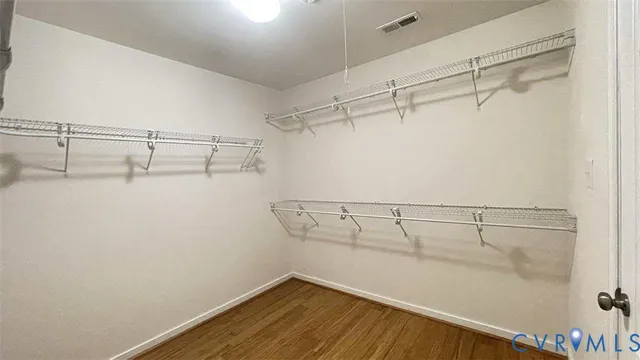 a view of a room with racks on the wall