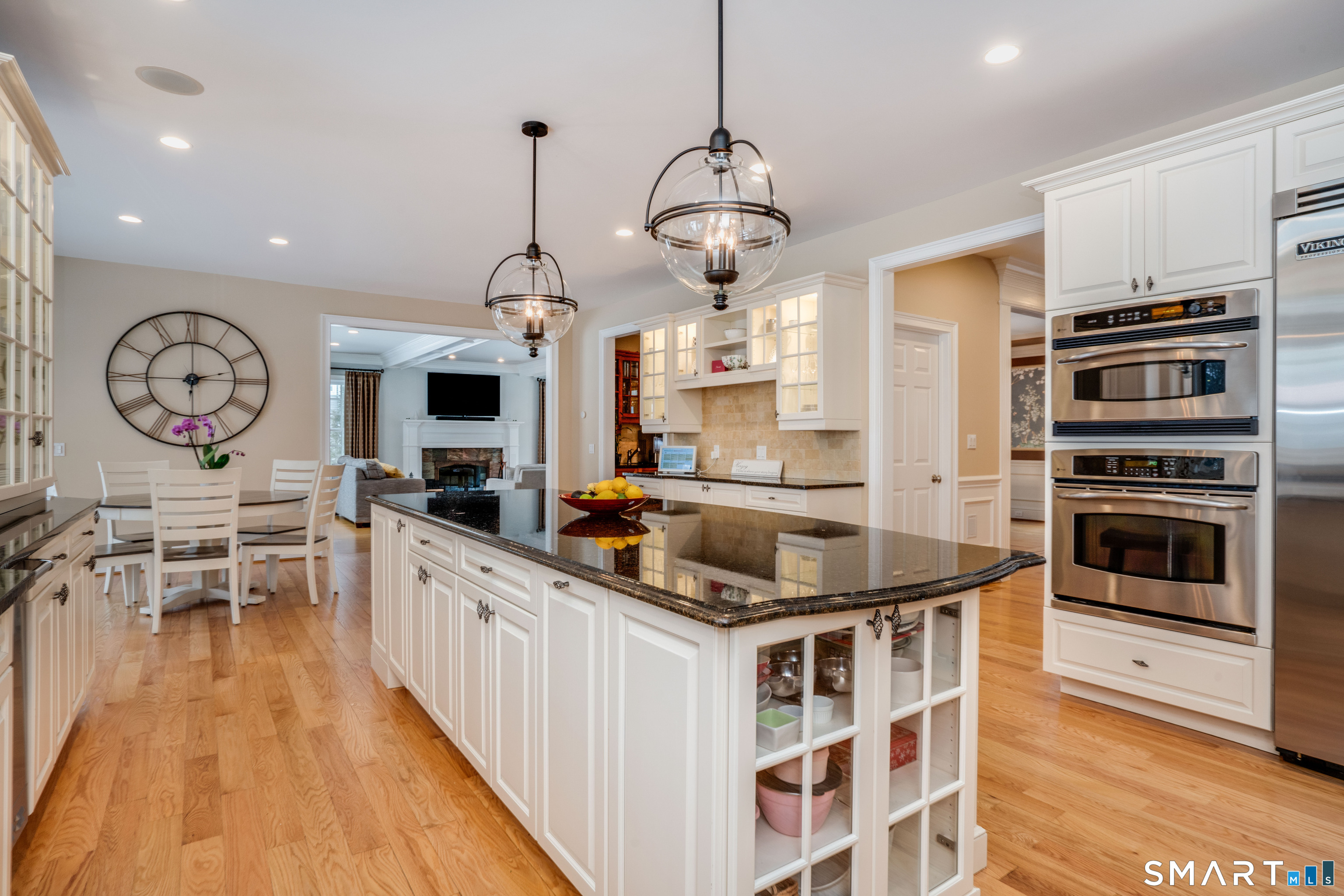 51 Westland Road Avon, CT 06001 - Photo 17 of 48 a kitchen with stainless steel appliances granite countertop a stove and a view of living room