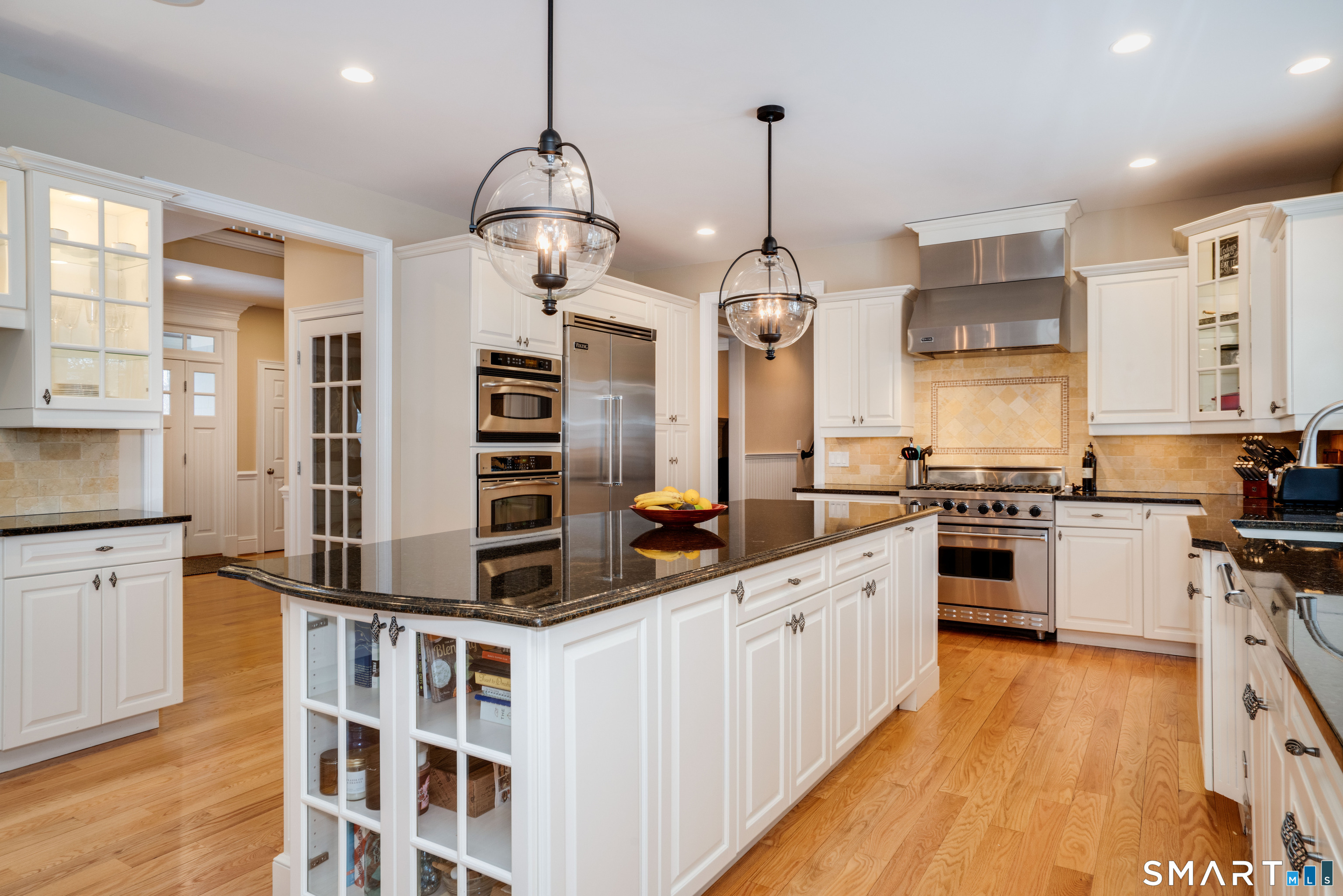 51 Westland Road Avon, CT 06001 - Photo 18 of 48 a kitchen with stainless steel appliances a stove oven and cabinets