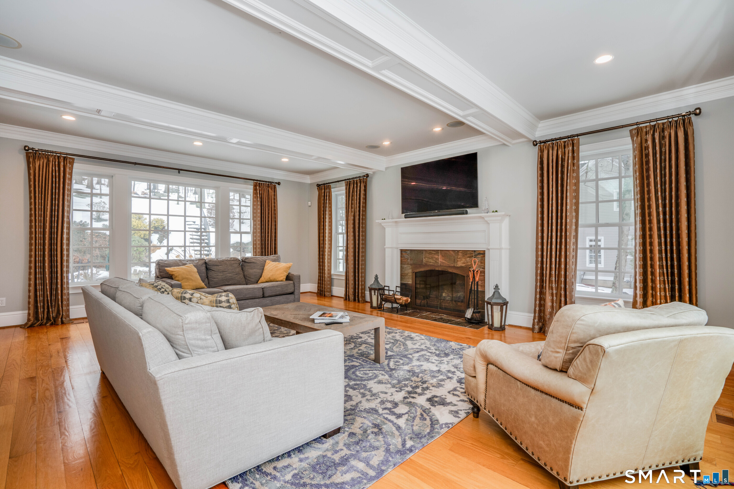 51 Westland Road Avon, CT 06001 - Photo 20 of 48 a living room with furniture fireplace and flat screen tv