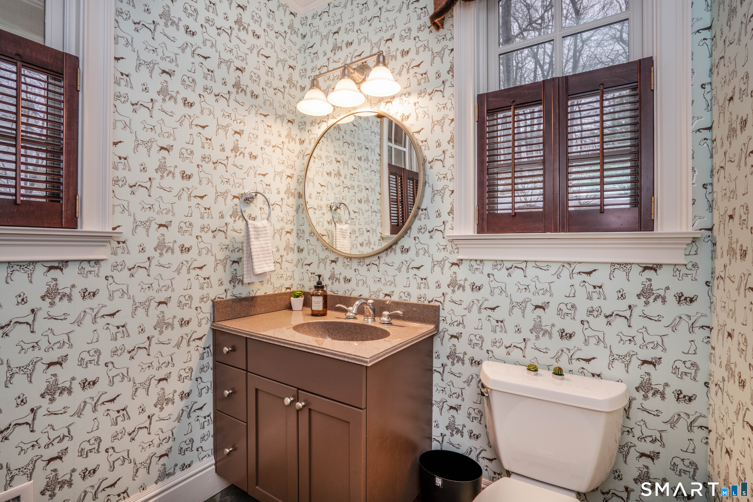 51 Westland Road Avon, CT 06001 - Photo 26 of 48 a bathroom with a toilet sink and mirror