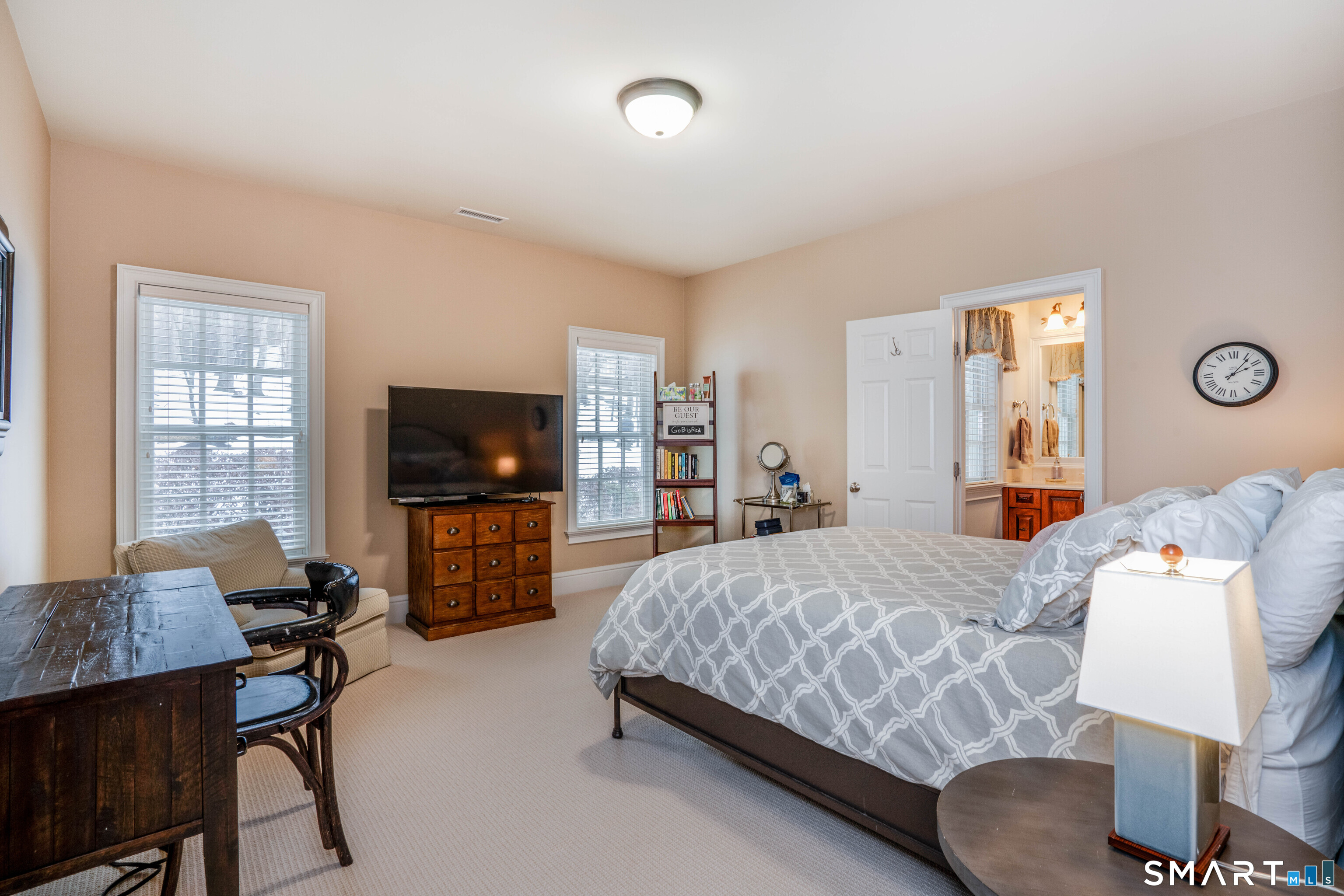 51 Westland Road Avon, CT 06001 - Photo 36 of 48 a bedroom with a bed and a flat screen tv