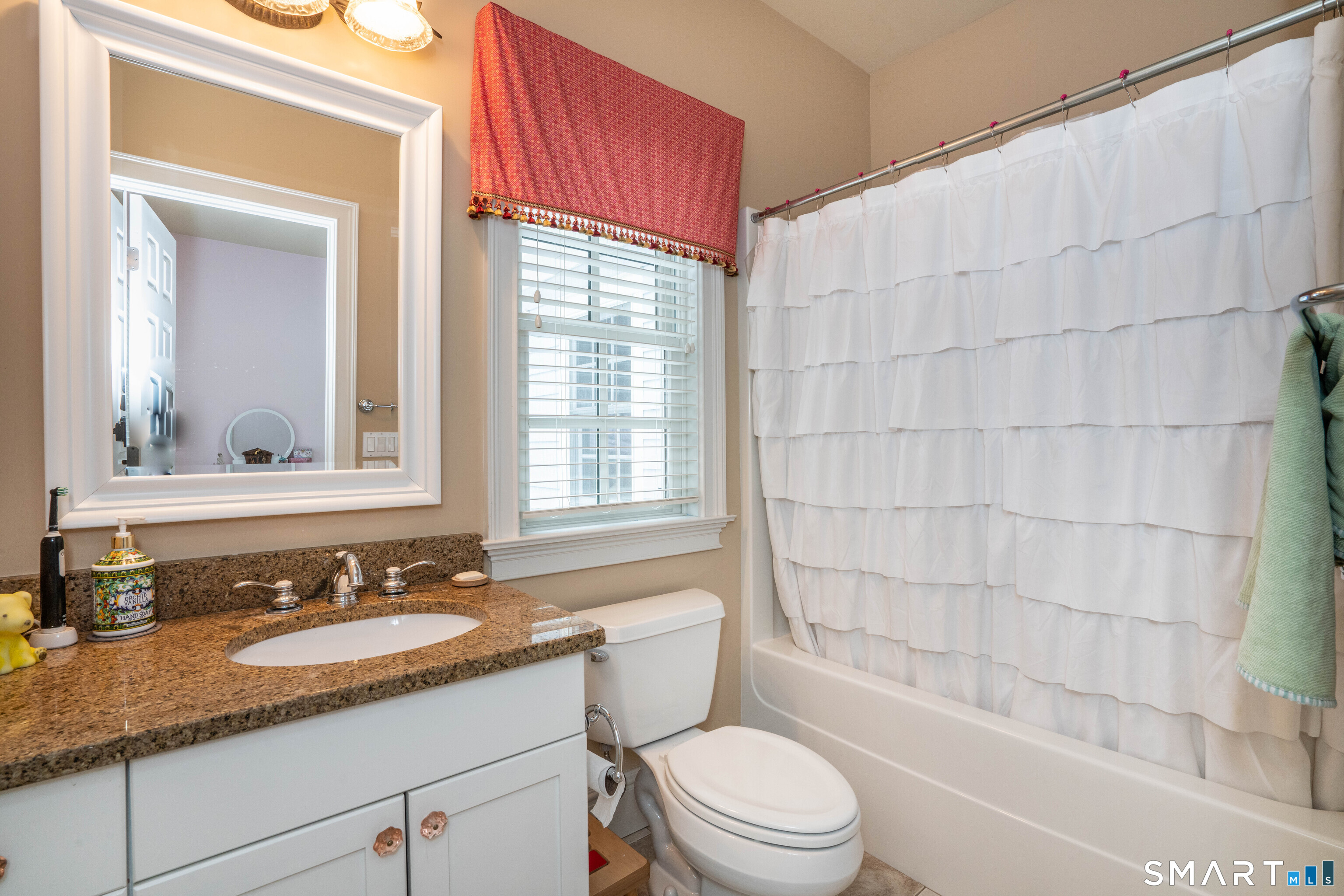 51 Westland Road Avon, CT 06001 - Photo 38 of 48 a bathroom with a granite countertop sink toilet and shower
