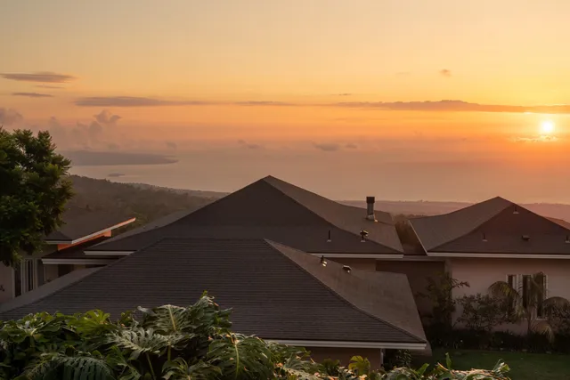 a view of a lake with a yard