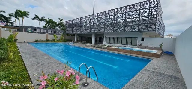 a view of house with outdoor space and seating area