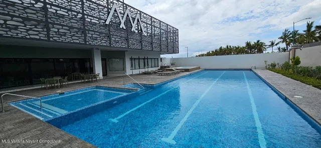 a view of a balcony with city view