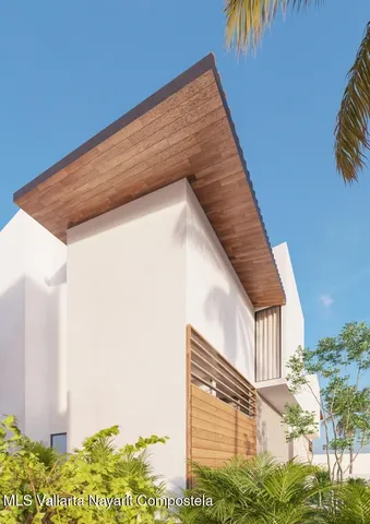 a kitchen with stainless steel appliances kitchen island granite countertop a sink and cabinets