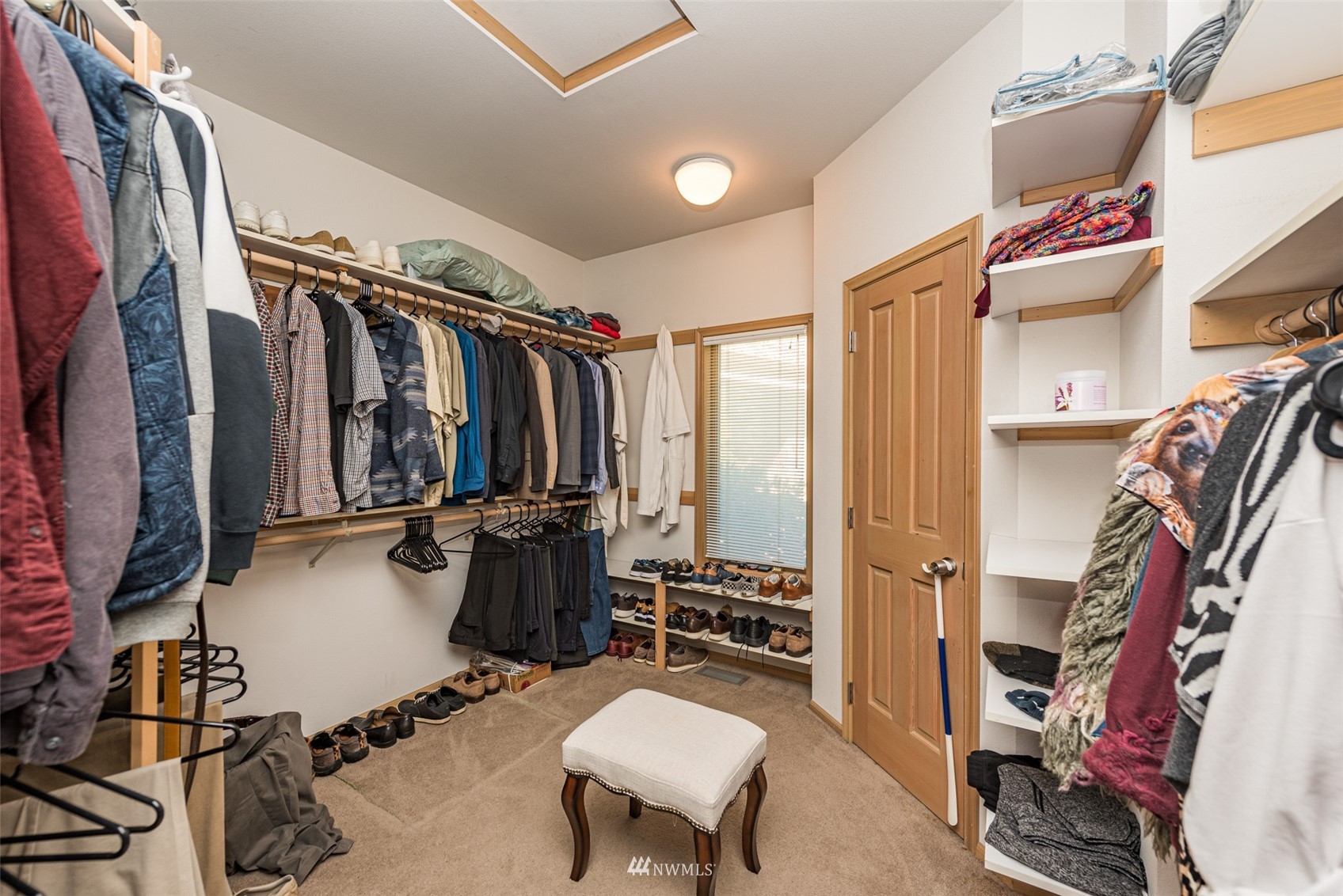 4949 Woodcock Road Sequim, WA 98382 - Photo 20 of 40 a view of walk in closet with clothes and shoes
