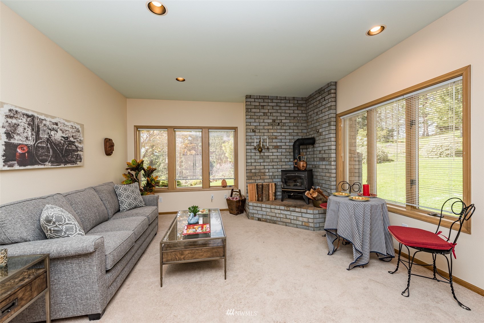 4949 Woodcock Road Sequim, WA 98382 - Photo 31 of 40 a living room with furniture and a large window