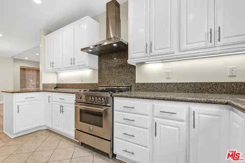 a view of a kitchen with a sink and dishwasher kitchen view