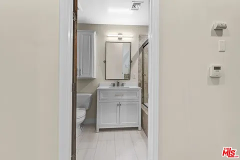 front view of a house with a garden