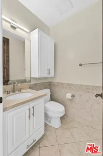 a view of a hallway with two rooms