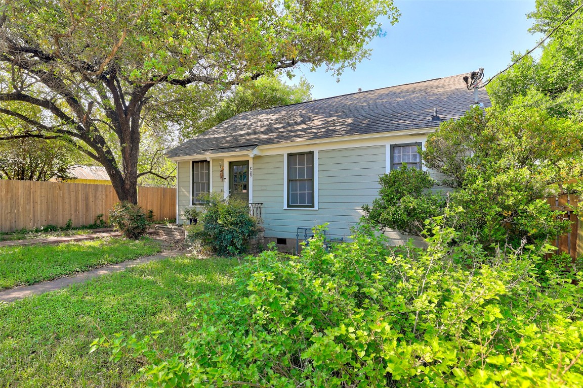 809 East 44th Street Austin, TX 78751 - Photo 2 of 40 View of front of house featuring fence and a shingled roof