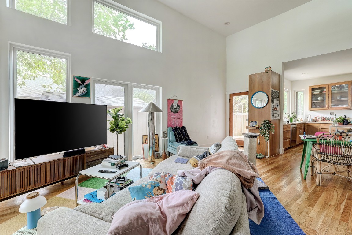 809 East 44th Street Austin, TX 78751 - Photo 33 of 40 Living room with a high ceiling and light wood-style flooring