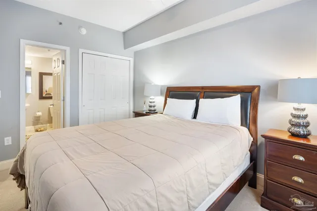 a bathroom with a toilet a sink and a mirror