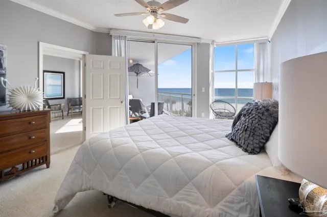 a kitchen with stainless steel appliances kitchen island granite countertop a refrigerator and a stove top oven