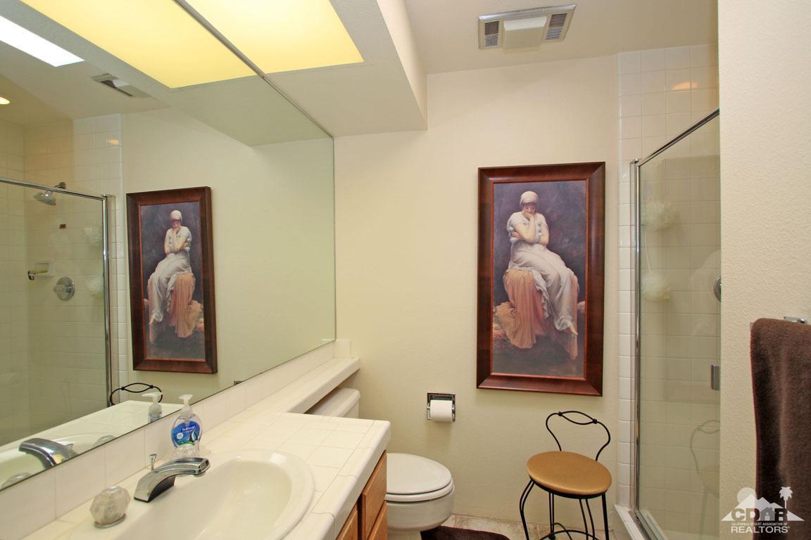 17 Mission Court Rancho Mirage, CA 92270 - Photo 25 of 37 a bathroom with a toilet sink and mirror
