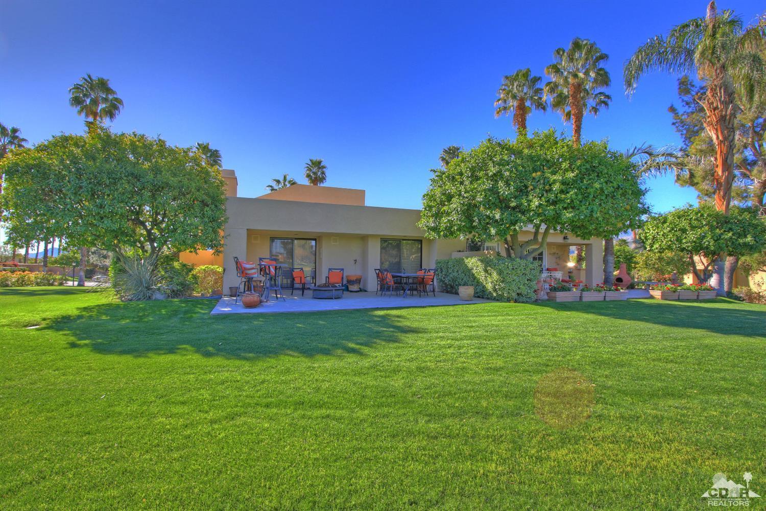 17 Mission Court Rancho Mirage, CA 92270 - Photo 30 of 37 a view of a house with a big yard