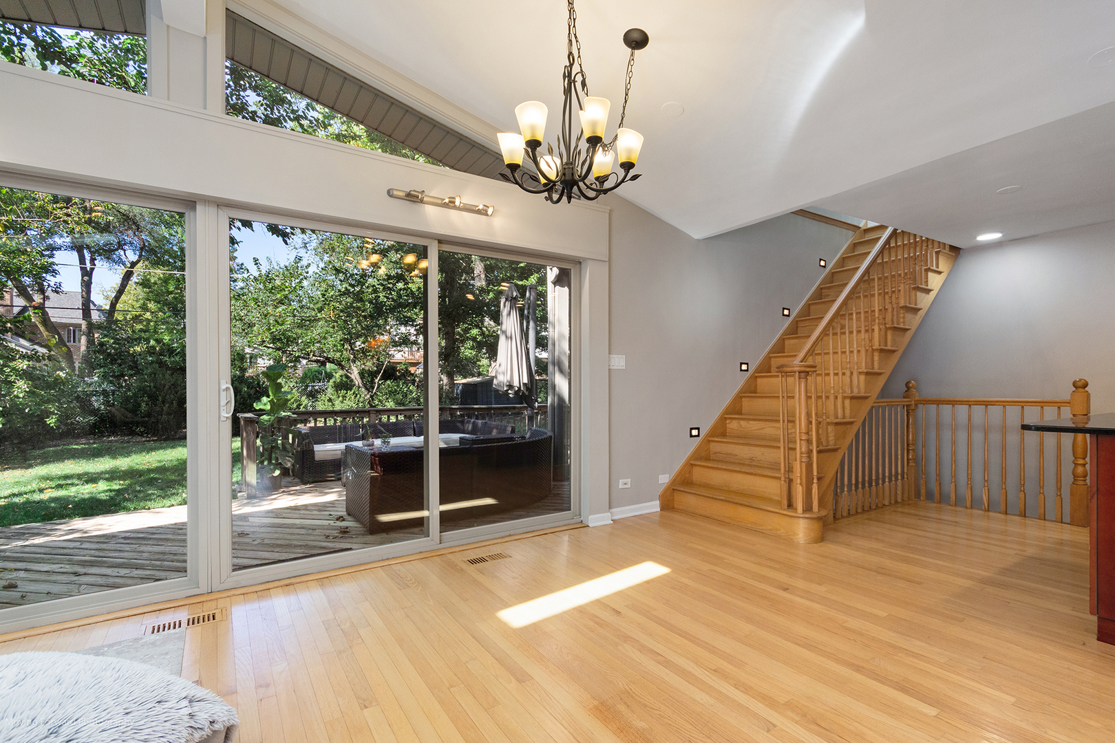 244 North Jackson Road Clarendon Hills, IL 60514 - Photo 13 of 26 a view of a room with wooden floor outdoor seating and stairs