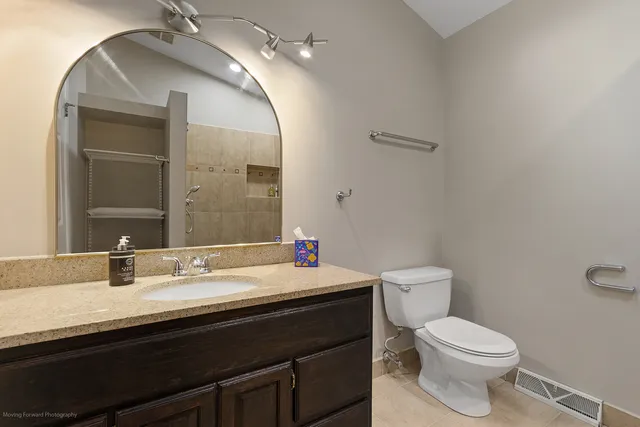 a bathroom with a sink and a toilet