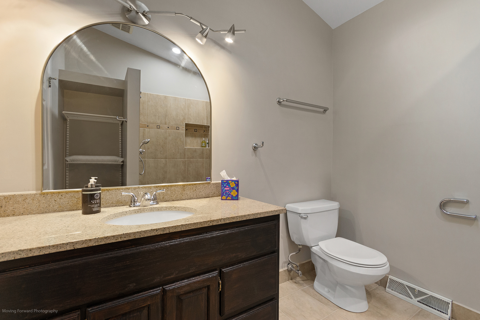 244 North Jackson Road Clarendon Hills, IL 60514 - Photo 18 of 26 a bathroom with a sink and a toilet
