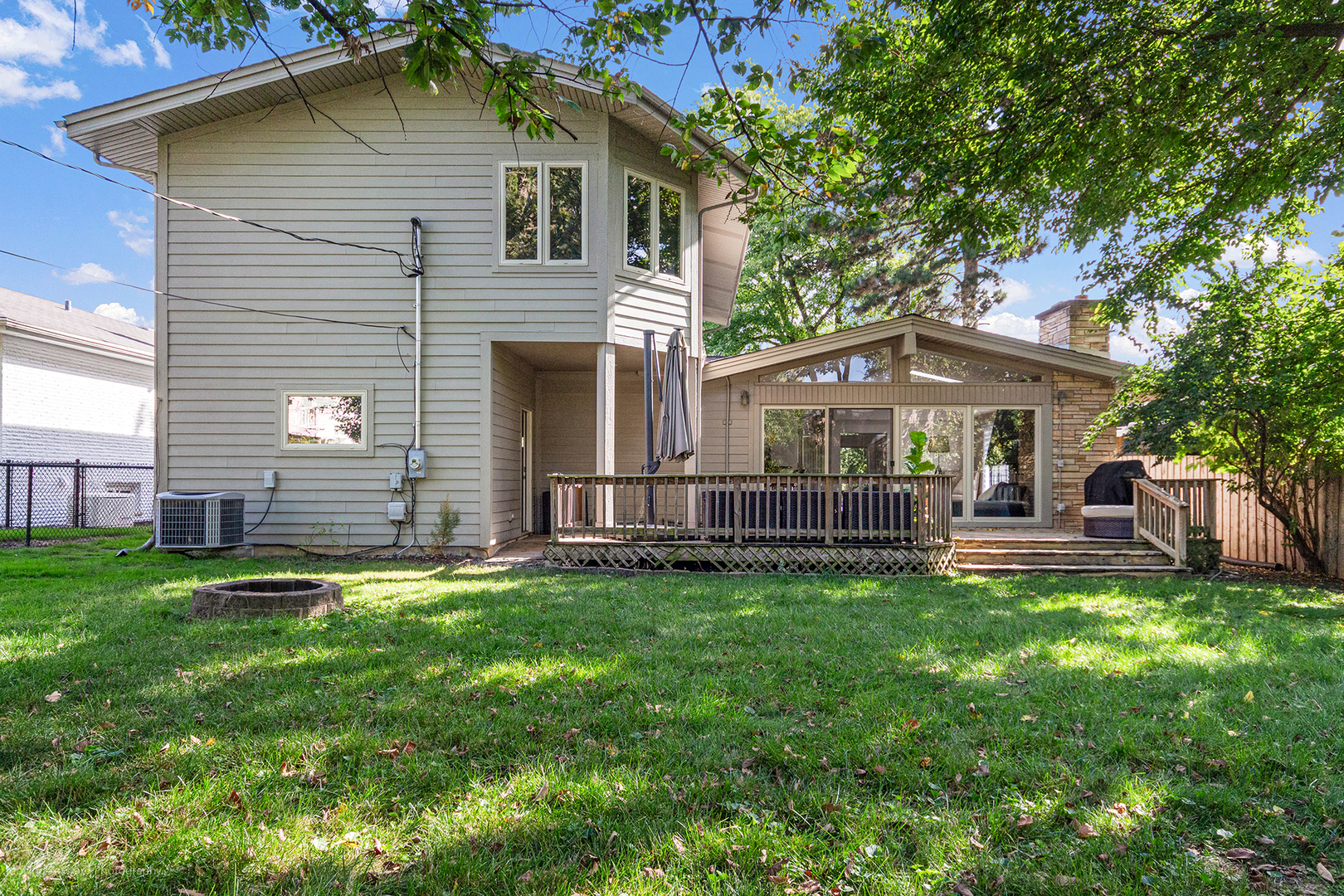 244 North Jackson Road Clarendon Hills, IL 60514 - Photo 25 of 26 a view of a house with a yard and sitting area