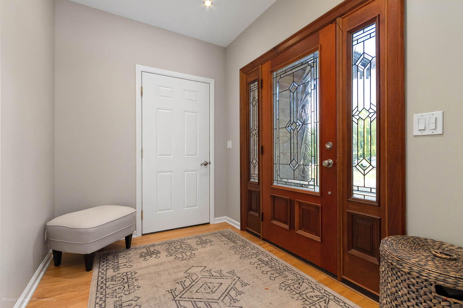 244 North Jackson Road Clarendon Hills, IL 60514 - Photo 3 of 26 a bedroom with a bed and a window