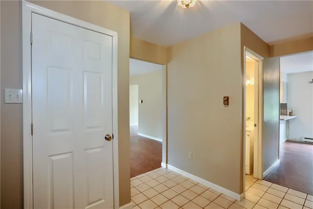 a bathroom with a toilet sink and vanity
