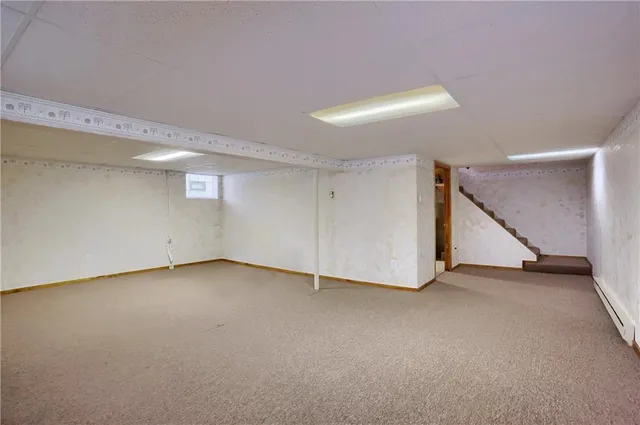 a workspace with furniture and window