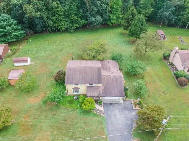 a view of a yard with an outdoor space