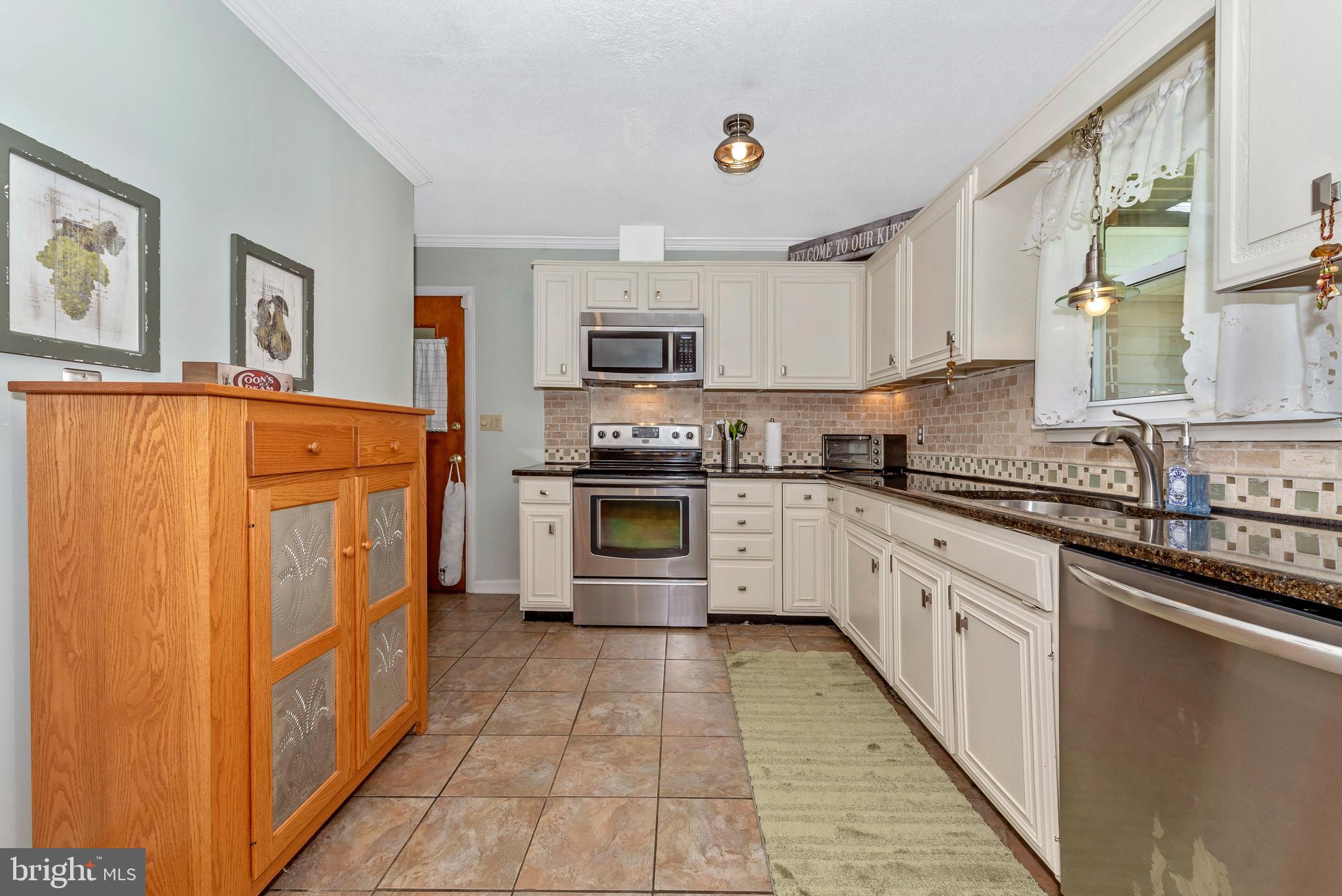 4830 Teen Barnes Road Frederick, MD 21703 - Photo 15 of 59 Tiel floor
