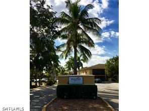 5317 Summerlin Road, Unit 1716 Fort Myers, FL 33919 - Photo 1 of 5 a view of a house with a patio