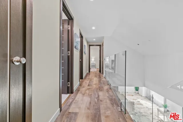 a spacious bedroom with a bed and a couch